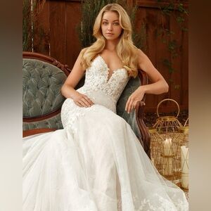 Ti Adora by Alvina Valenta Ivory Lace Plunge Neck Wedding Gown